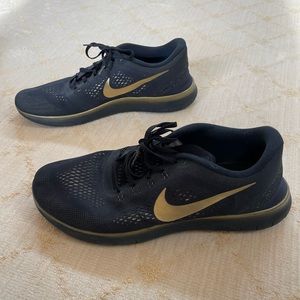 Nike Black Sneakers With Gold Logo